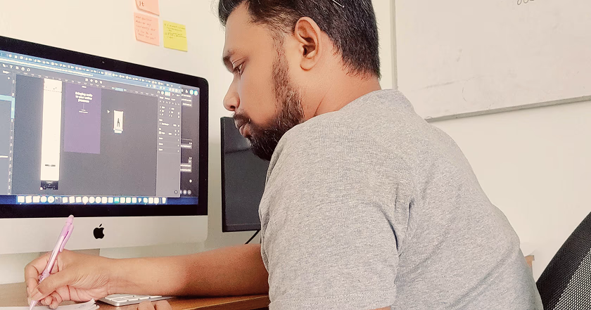 Abdus profile photo working at computer